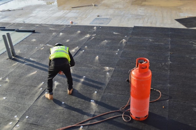 The base layer for the roof of the new Maple Centre is underway