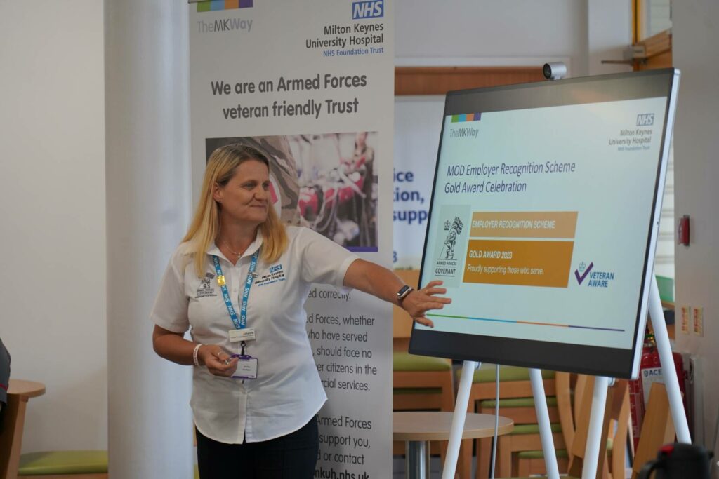 Armed Forces Officer Johanna presenting at the Gold Award announcement 